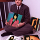Clinton enjoys some of his Joan Jett albums in a White House hallway. Right: the fan letter.